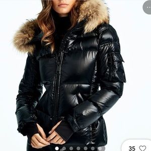 Sam. Black puffer jacket